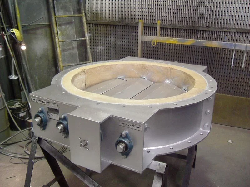 High-temperature guillotine damper